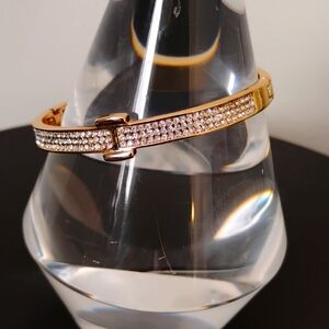 18 kt GF  fold over clasp pave' bracelet. Size 7 or 2 1/2 " x 2 1/4 ".